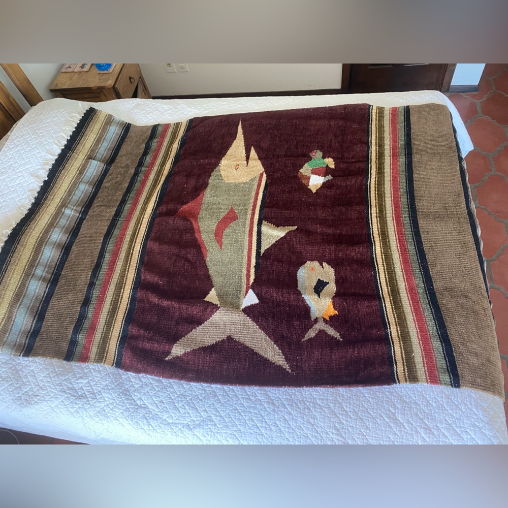 Reversible throw blanket with Fish and Turtle Design burgundy neutral colors